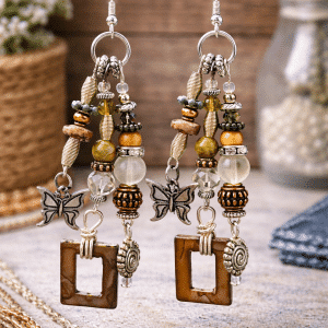 🌿 "Earthbound Wings" – Intricate Boho Chandelier Earrings with Butterfly and Spiral Charms