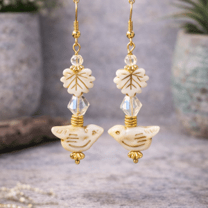🕊️ "Golden Meadow" – Artisan Ivory Bird and Leaf Dangle Earrings with Gold Accents